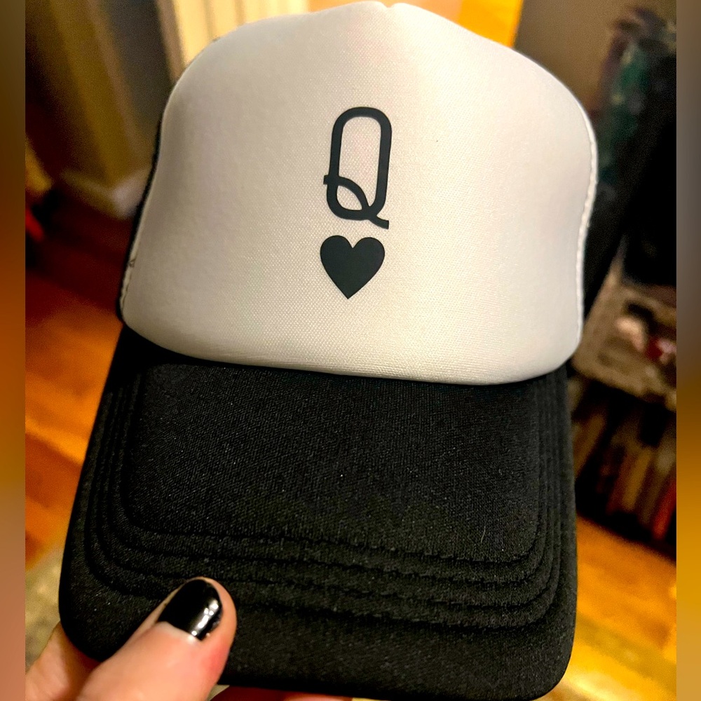 Black and White Trucker Hat with Q Heart Design